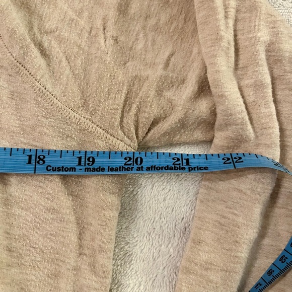 Athleta Beige Wrap Hoodie -Size L
Hole on the right sleeve by the cuff. 
Used - Picture 4 of 9